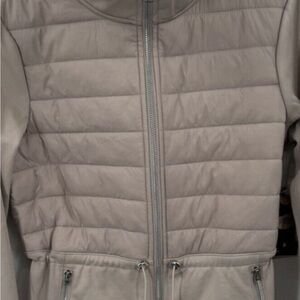 Beige quilted jacket. Size large. Ladies.